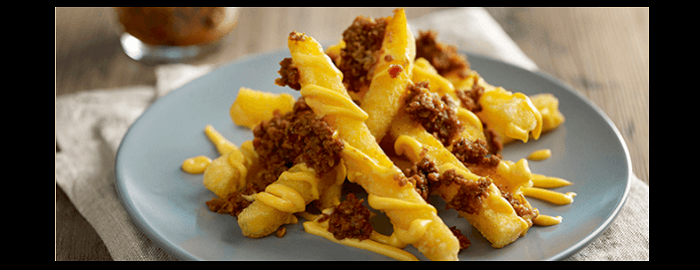 Delicious meal Tasty fries with cheese